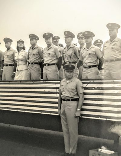 A group of men in uniform standing next to each other.
